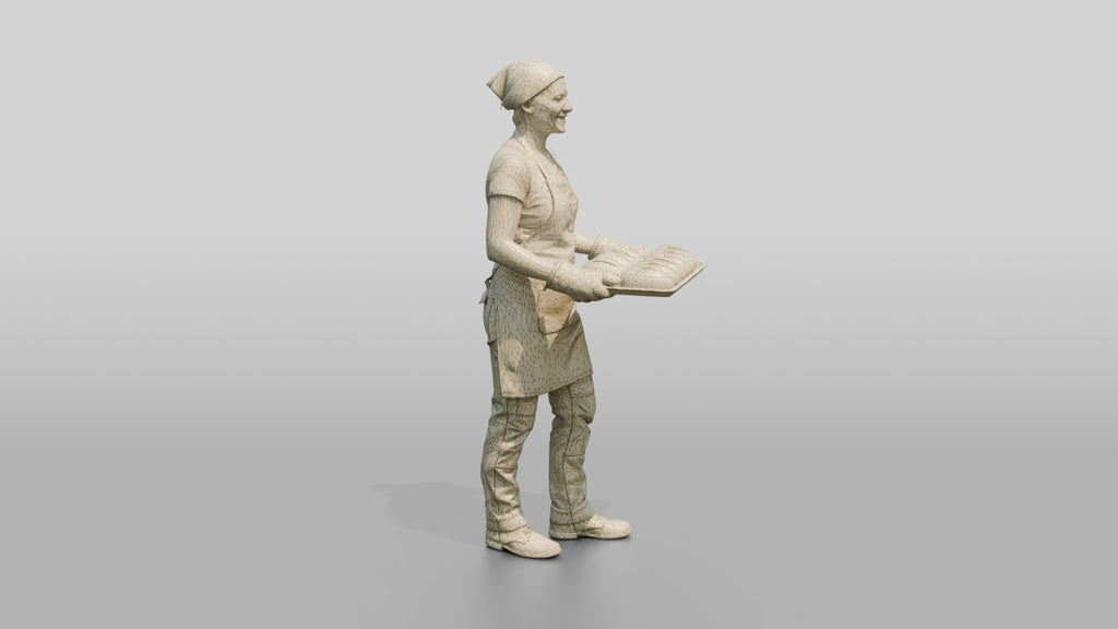 Baker Pulling Sourdough Loaves
