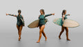 Woman Carrying Surfboard Toward the Waves