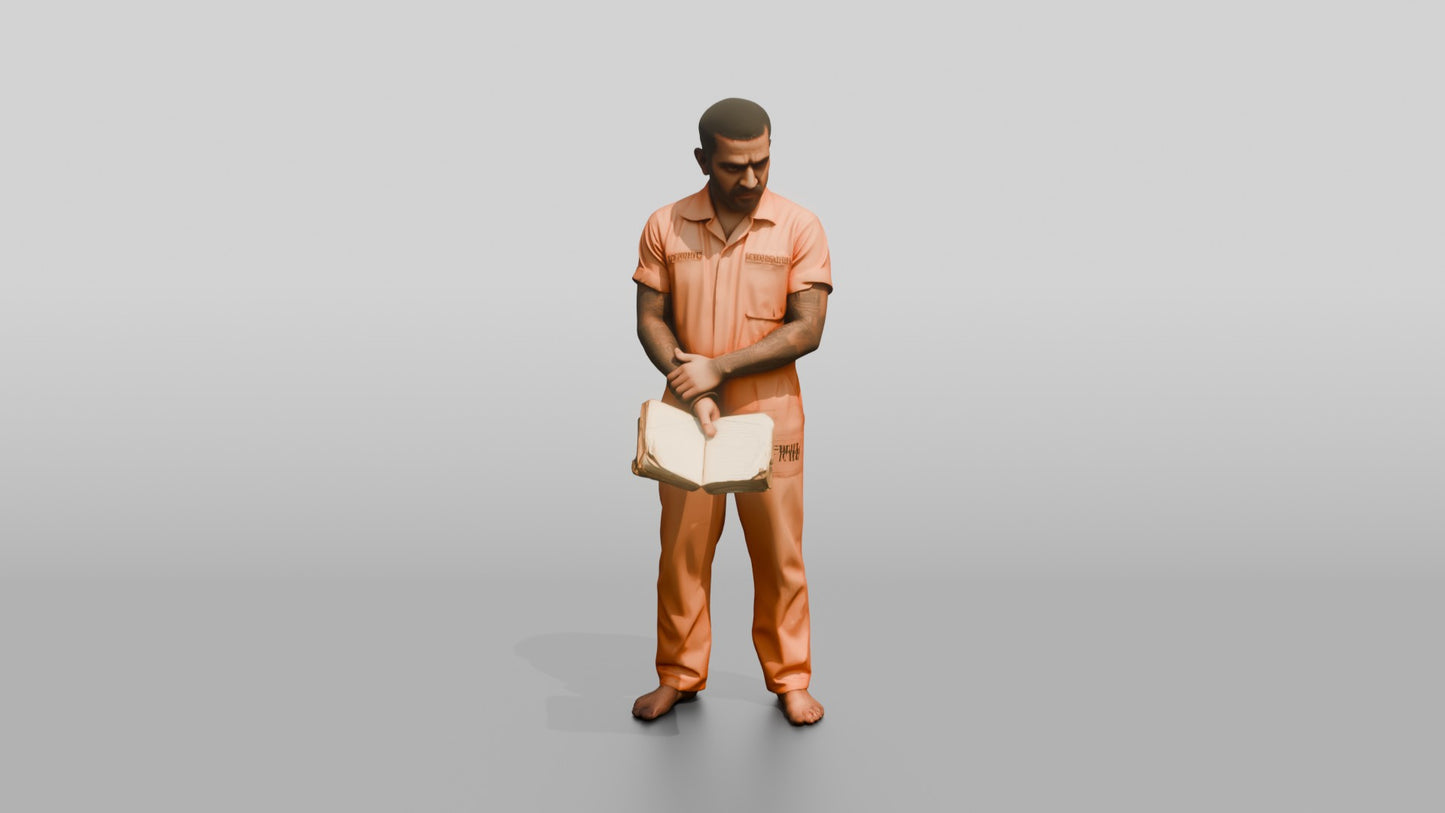 South Asian Male Prisoner Holding a Worn Book Open in One Hand