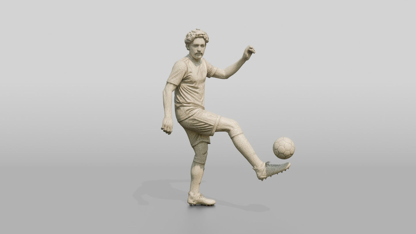 Soccer Player Juggling the Ball
