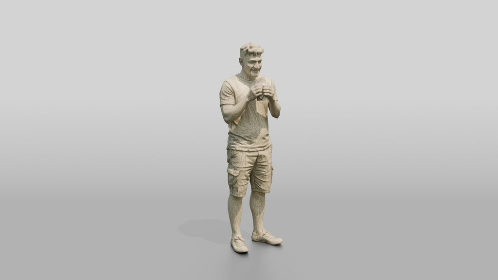 Stocky Young Turkish Man Eating a Pastry