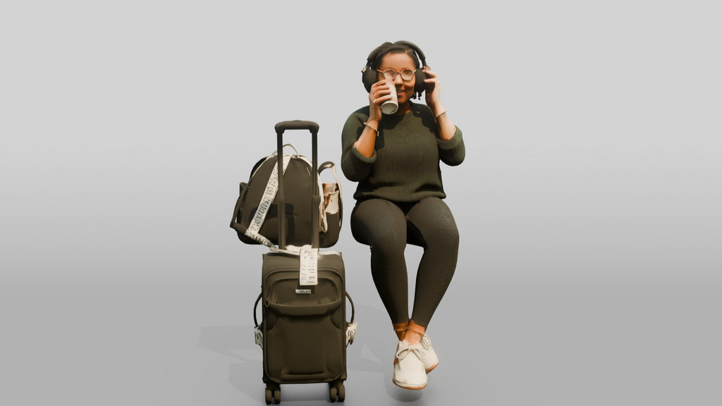 Plus-Size Black Woman Seated with Headphones Drinking Coffee