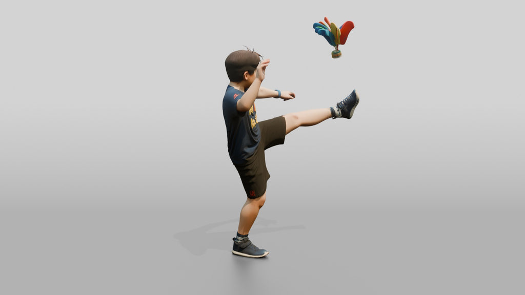 Chinese Boy Playing Jianzi Shuttlecock