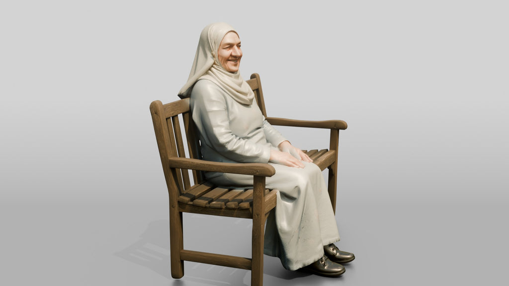 Elderly Iraqi Woman in Hijab Smiling on a Bench
