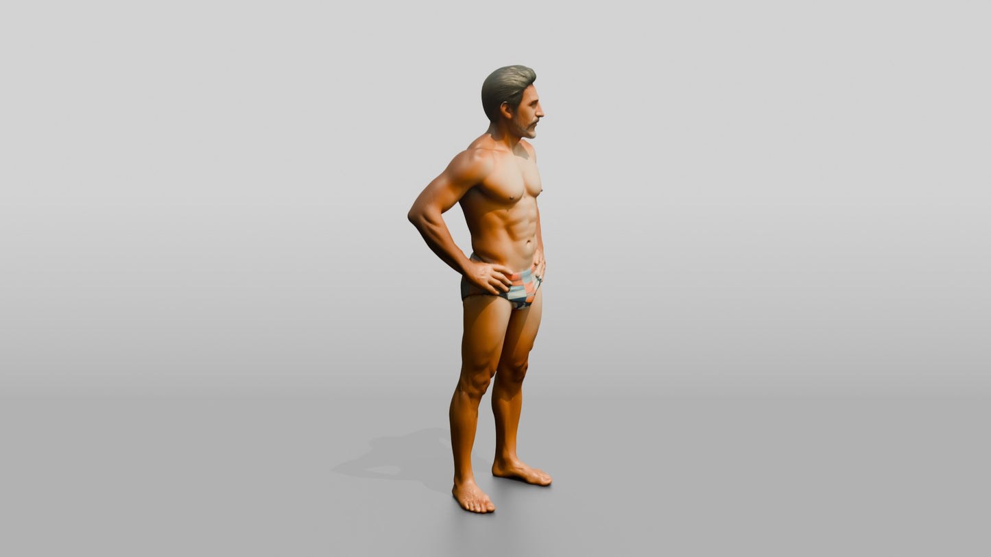 Mestizo Man Standing in Bold Patterned Swim Brief