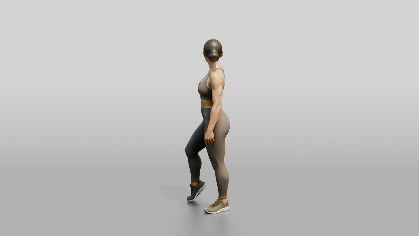 Woman in Taupe Activewear Glancing Over Her Shoulder