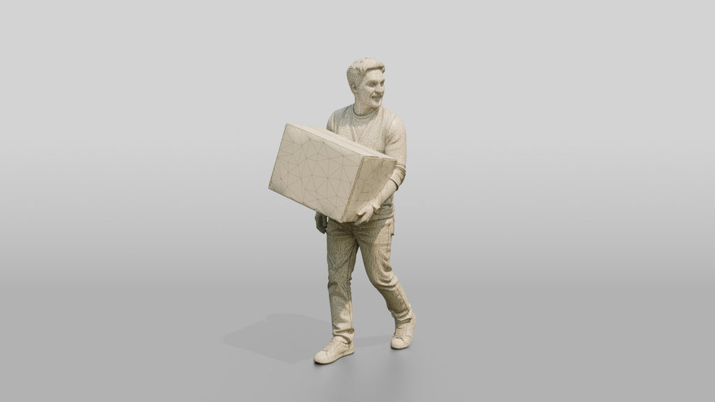 Man Carrying Cardboard Box