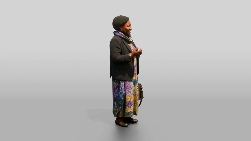 Woman in a Blazer Over a Tie-Dye Dress