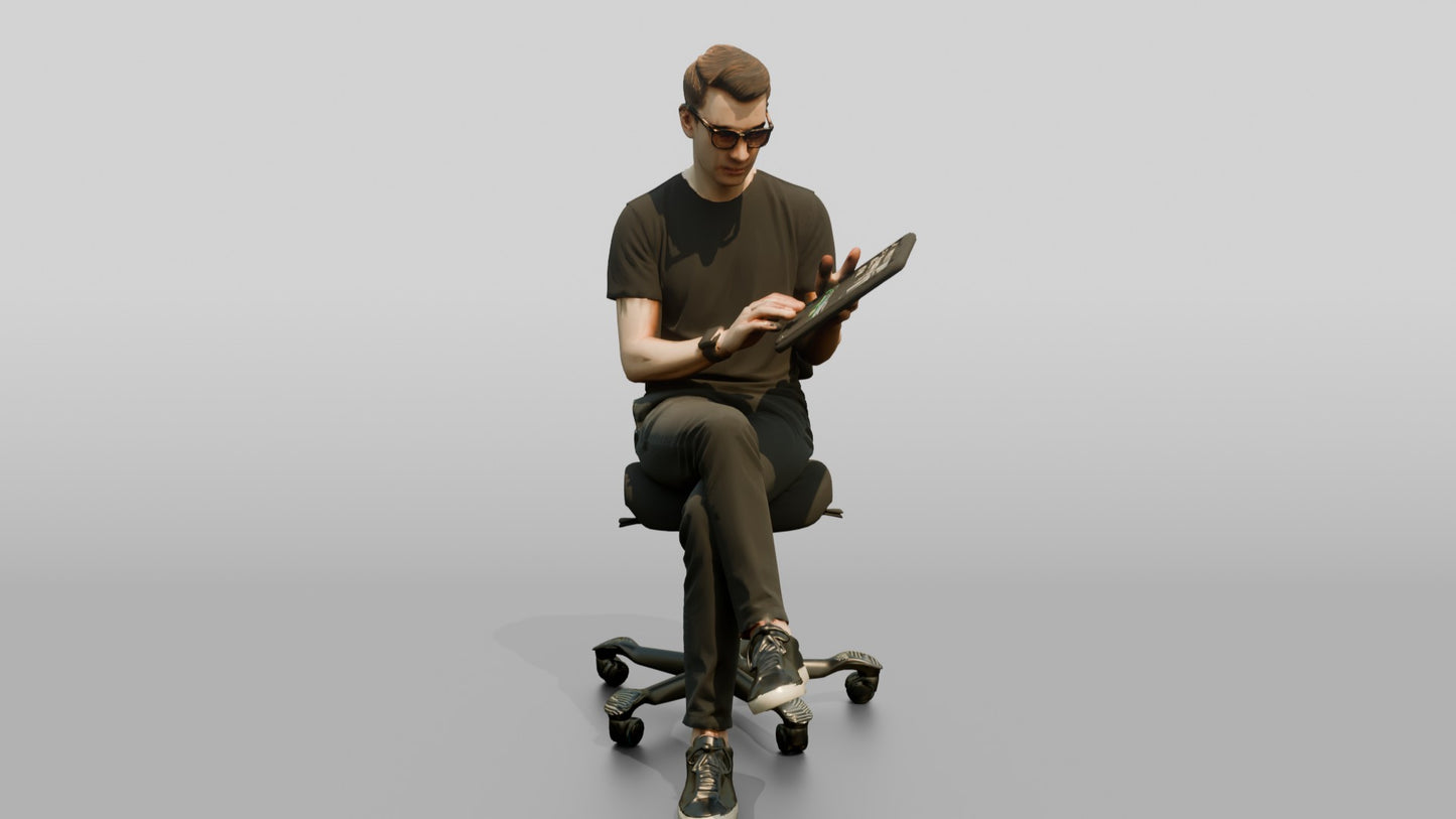 Man Seated with a Tablet and Glasses