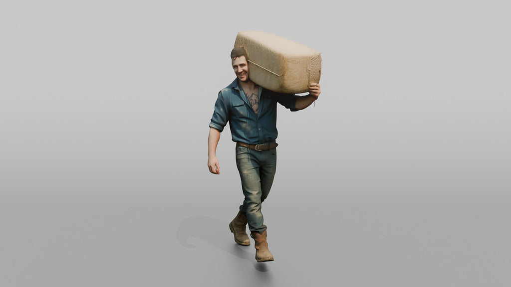 Farmer Carrying Large Bale Of Hay Over