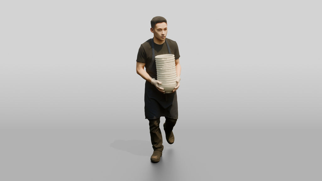Kitchen Porter Carrying Ceramic Bowls
