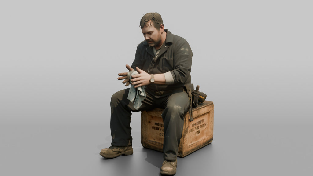 Engineer Resting on a Crate After a Long Shift