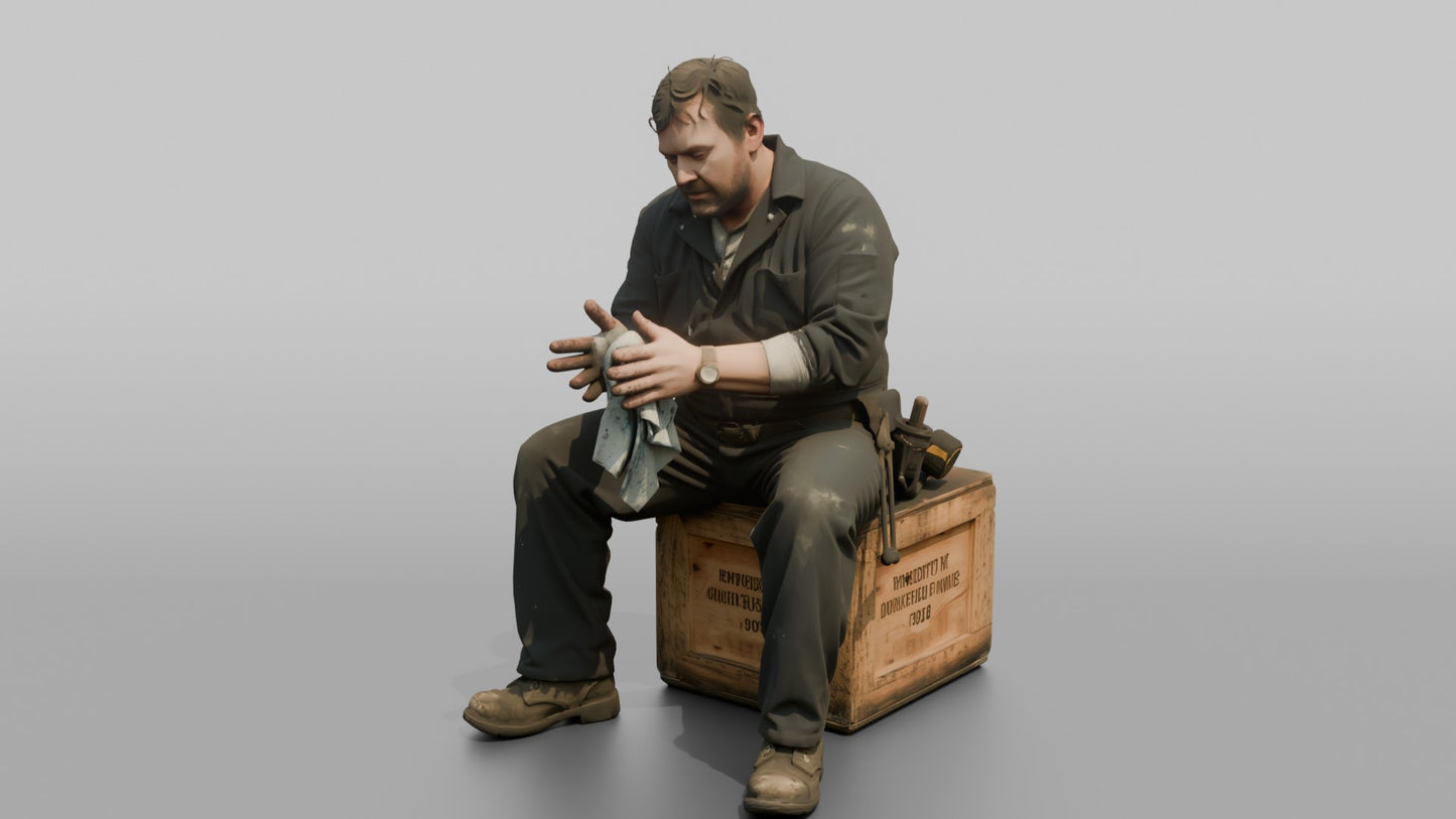 Engineer Resting on a Crate After a Long Shift