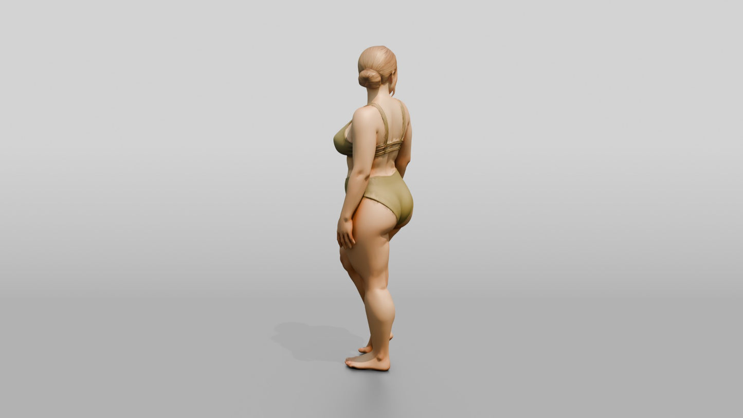 Curvy Woman in Olive Two-Piece Swimsuit Standing
