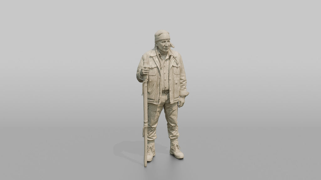 Hiker Holding a Carved Wooden Walking Stick