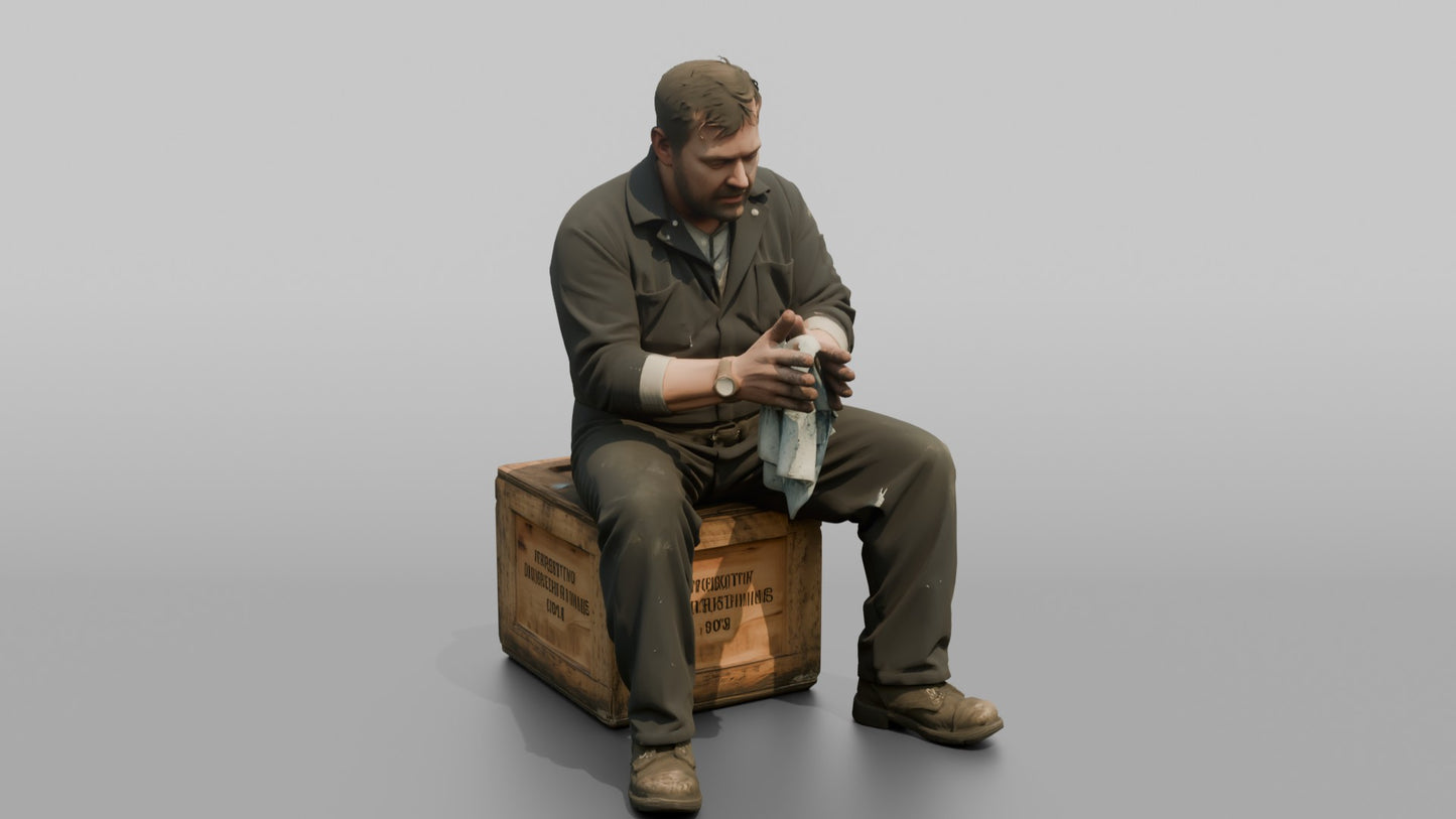 Engineer Resting on a Crate After a Long Shift