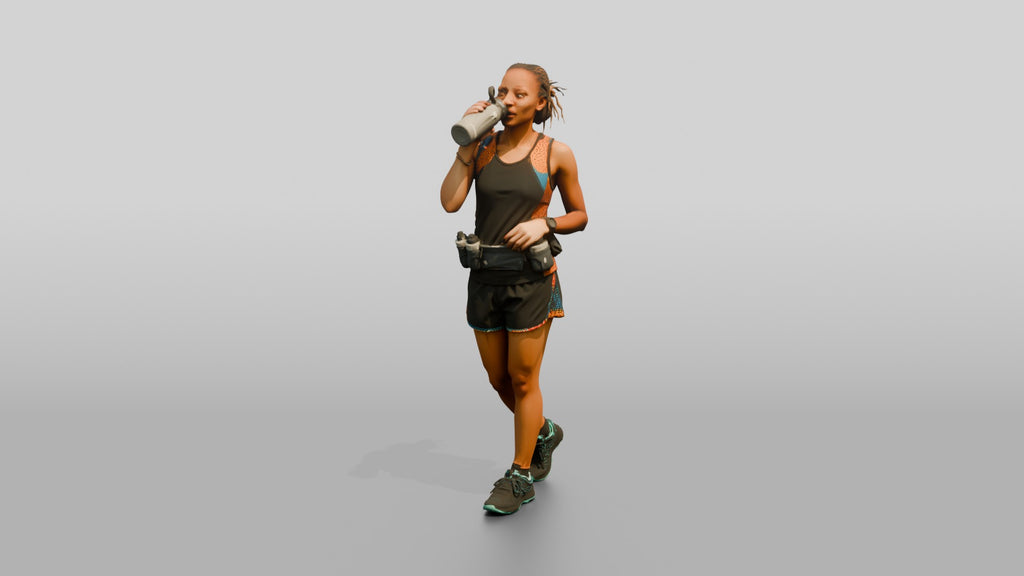 African Woman Runner Drinking Water