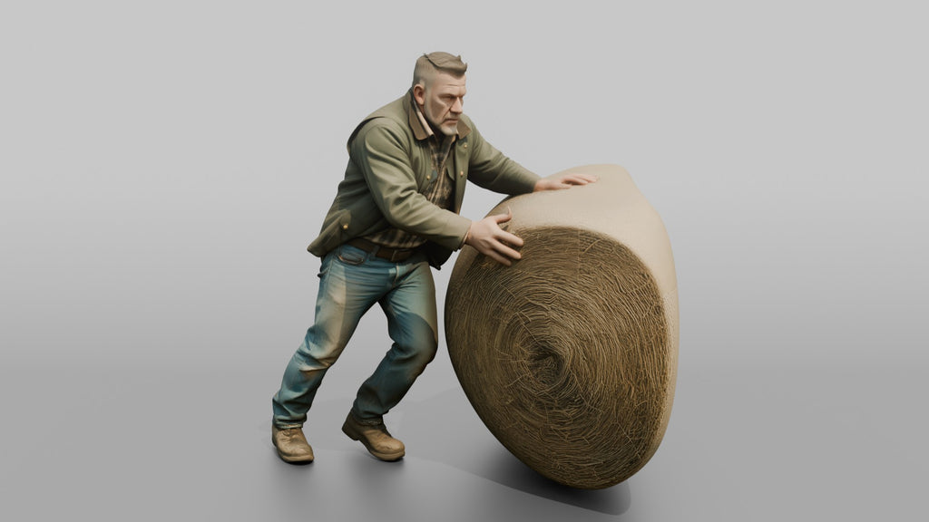 Farmer Rolling Large Round Hay Bale