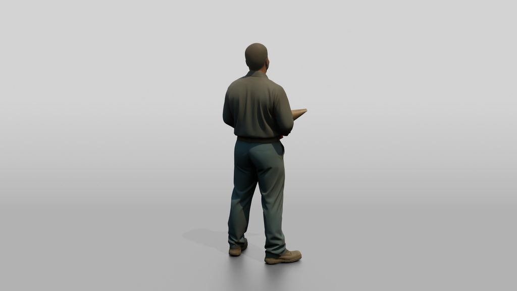 Mechanic Holding a Wheel Balancer Cone