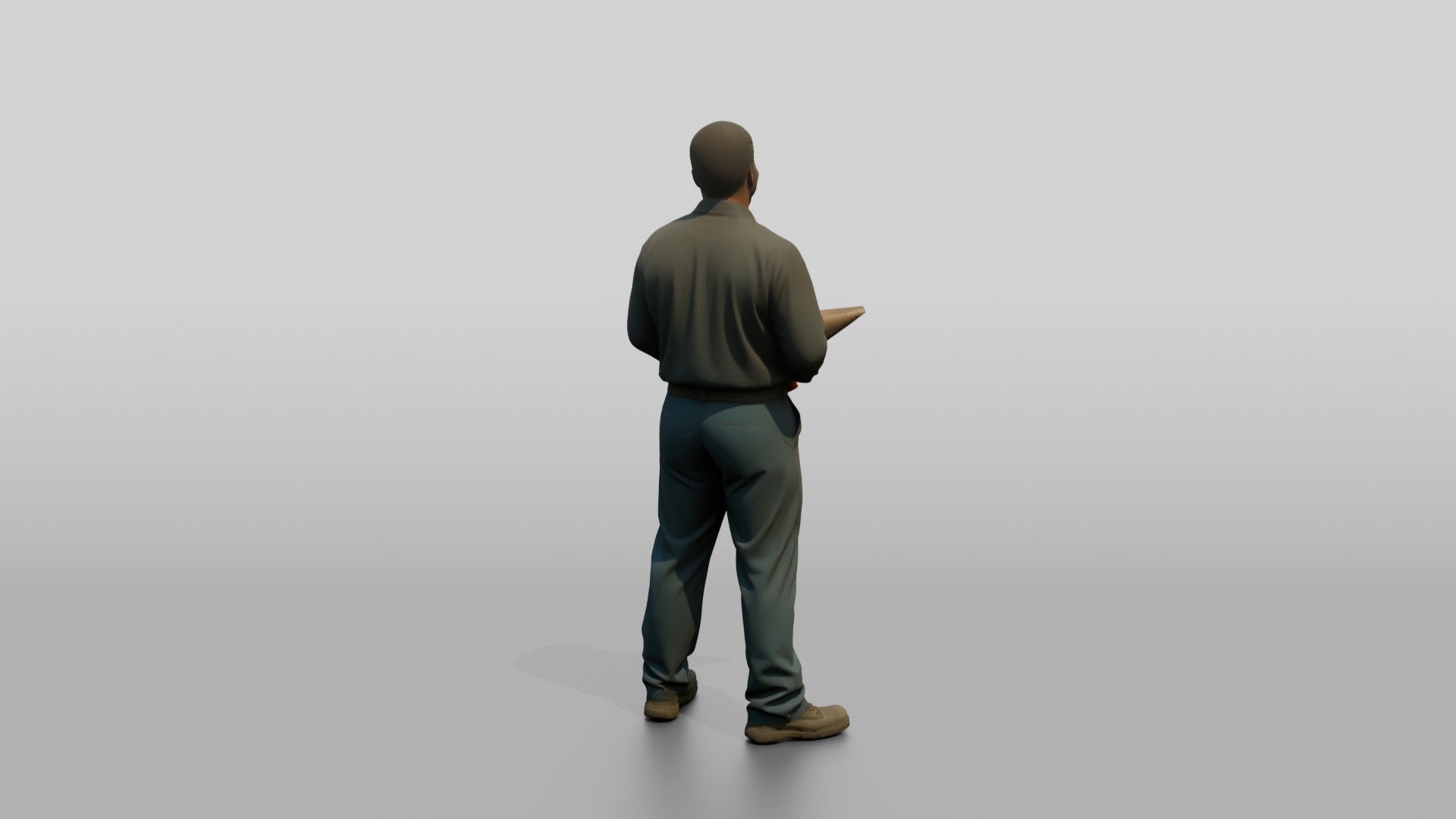 Mechanic Holding a Wheel Balancer Cone