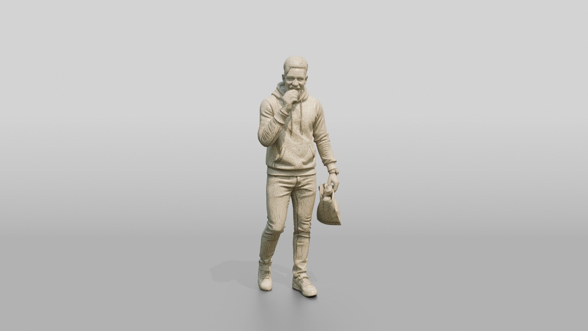 African Man in Print-Sleeve Hoodie Eating a Pastry