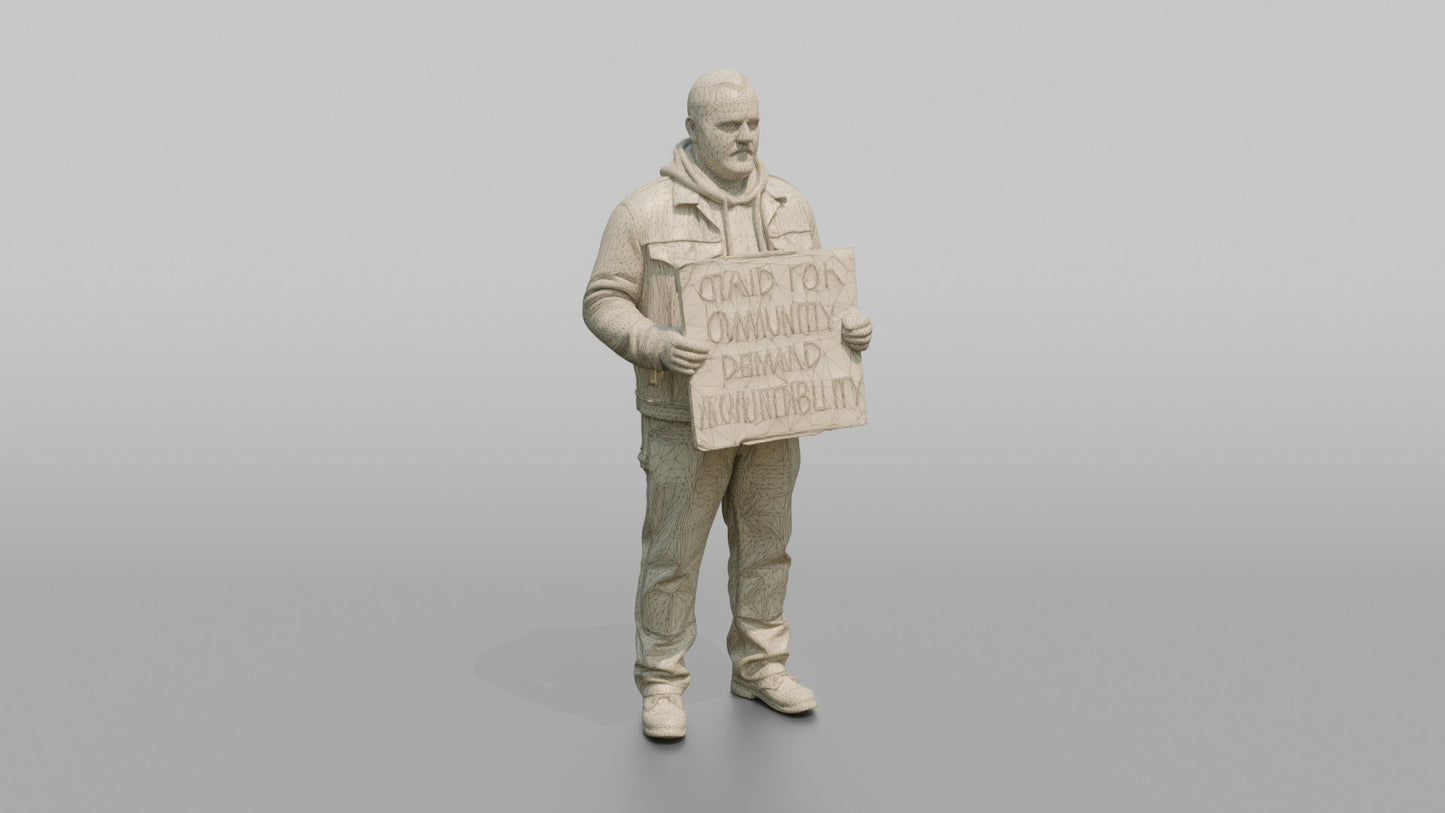Protester Man Holding a Cardboard Protest Sign