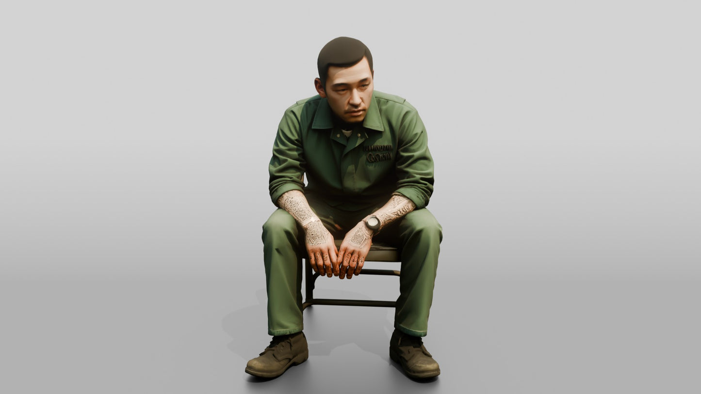 East Asian Male Prisoner in a Green Uniform