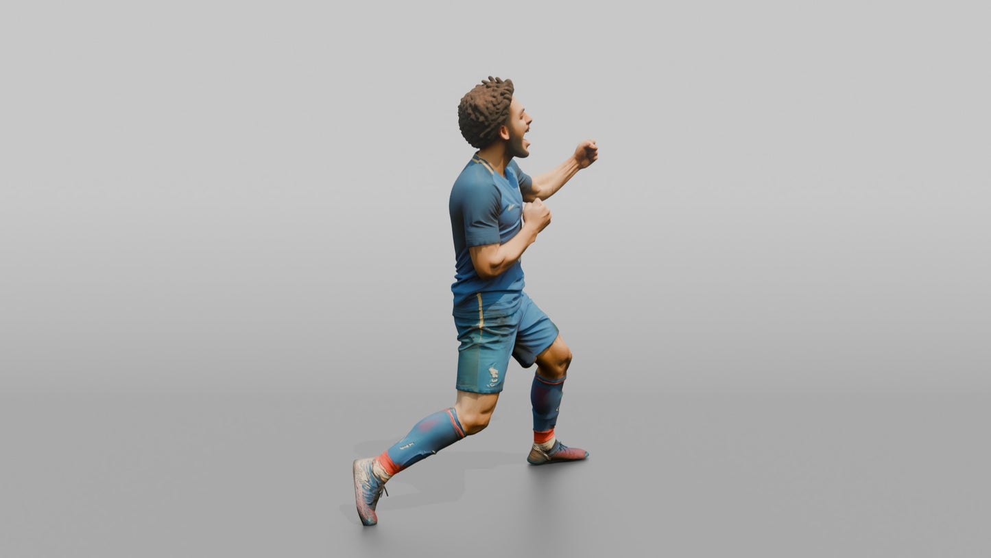 French Player Grabbing His Jersey Crest in Triumph