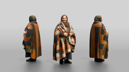Homeless Woman Draped in a Patchwork Quilt