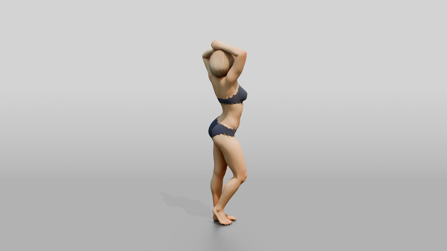 Blonde Woman in Navy Two-Piece Swimsuit Arms Raised