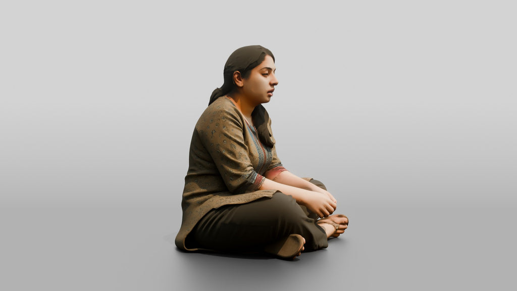 Homeless Woman Looking Dazed While Sitting Low to the Ground