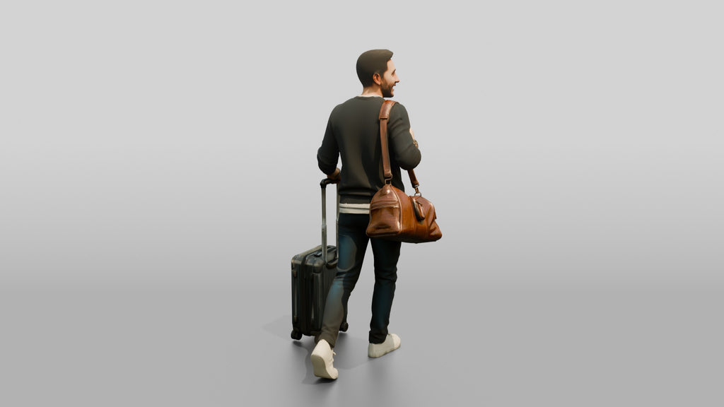 Young Man Walking with Rolling Suitcase and Leather Duffel Bag
