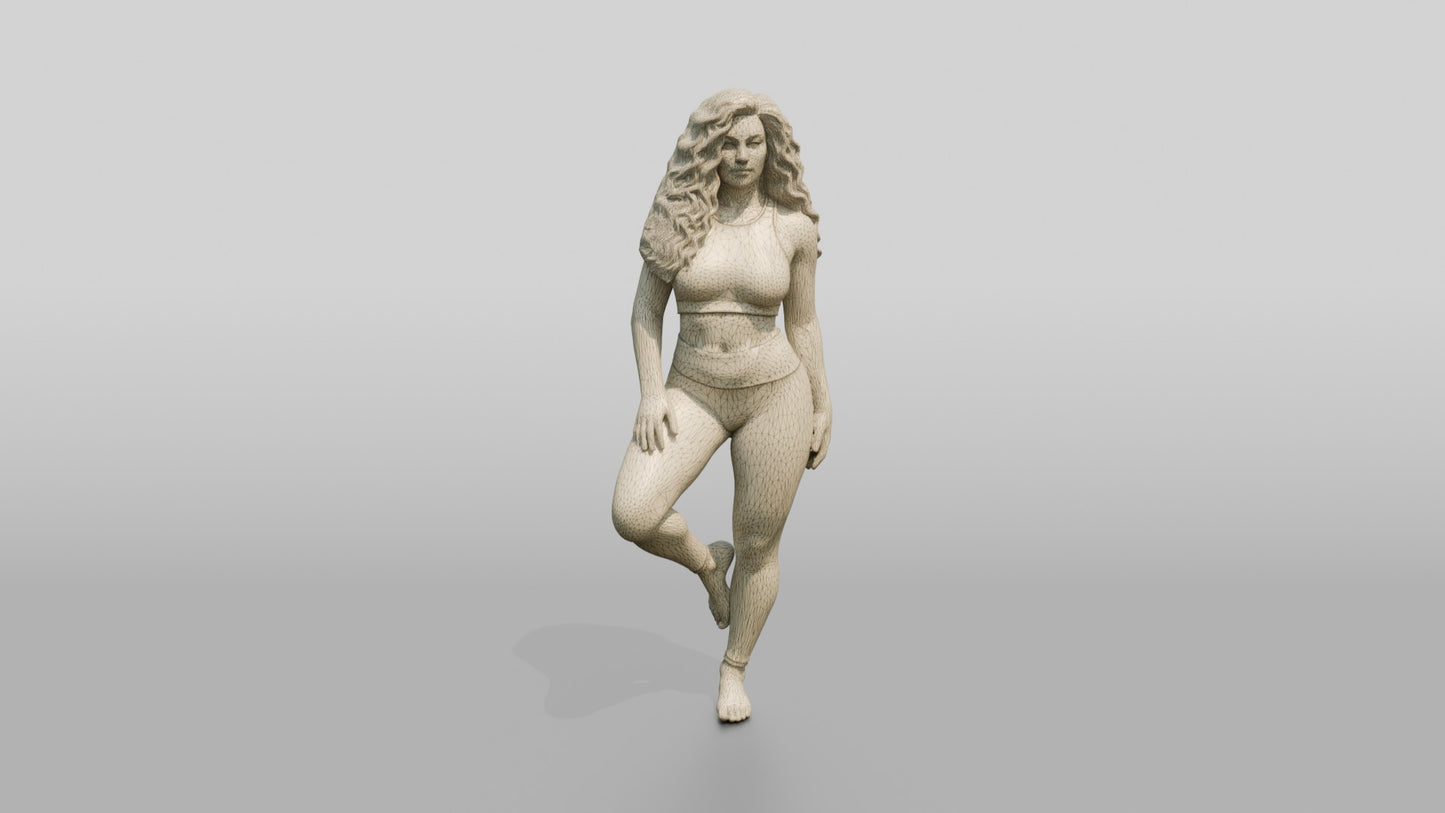Blonde Woman in Charcoal Activewear in Tree Pose
