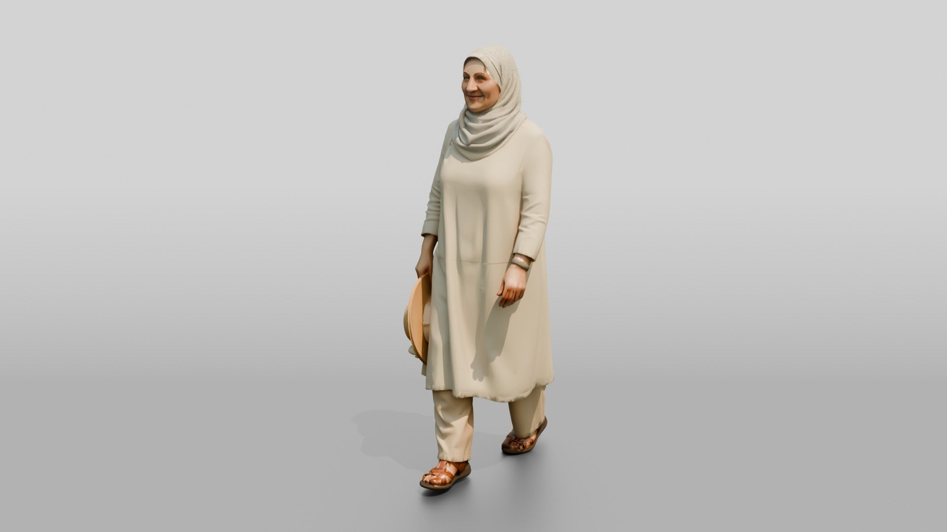 Middle-Aged Iraqi Woman in Hijab Carrying a Summer Hat