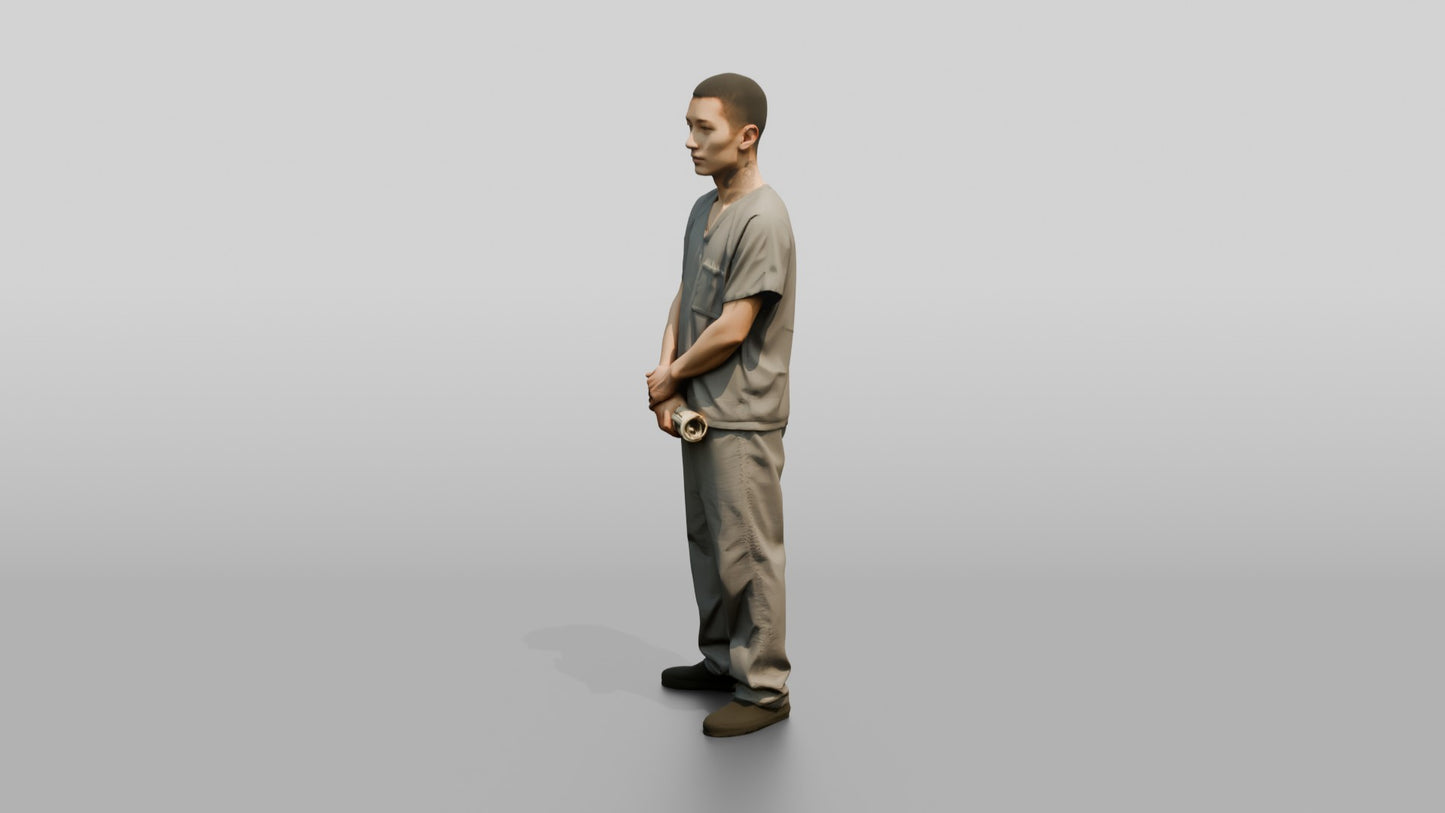 East Asian Male Prisoner in a Grey Scrub Uniform