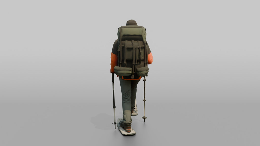 Winter Hiker Stepping Through Deep Snow