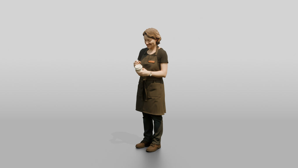 Woman Barista Writing Order on Cup