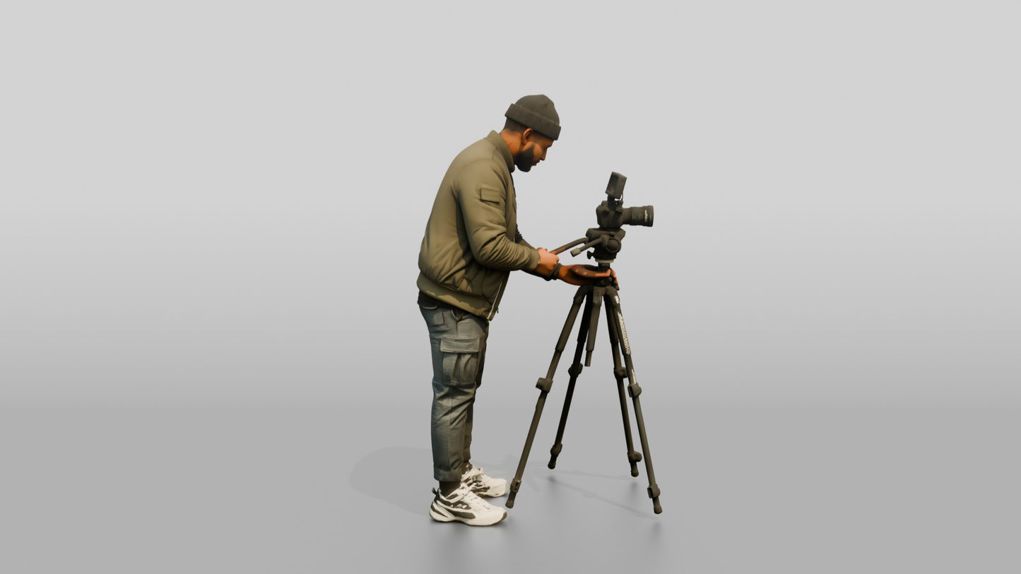 Videographer Setting Up a Camera