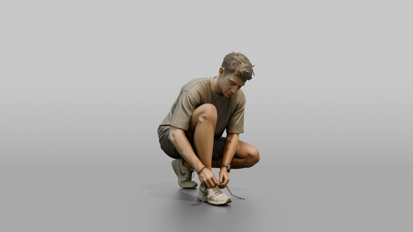 Man Crouching to Retie His Sneakers