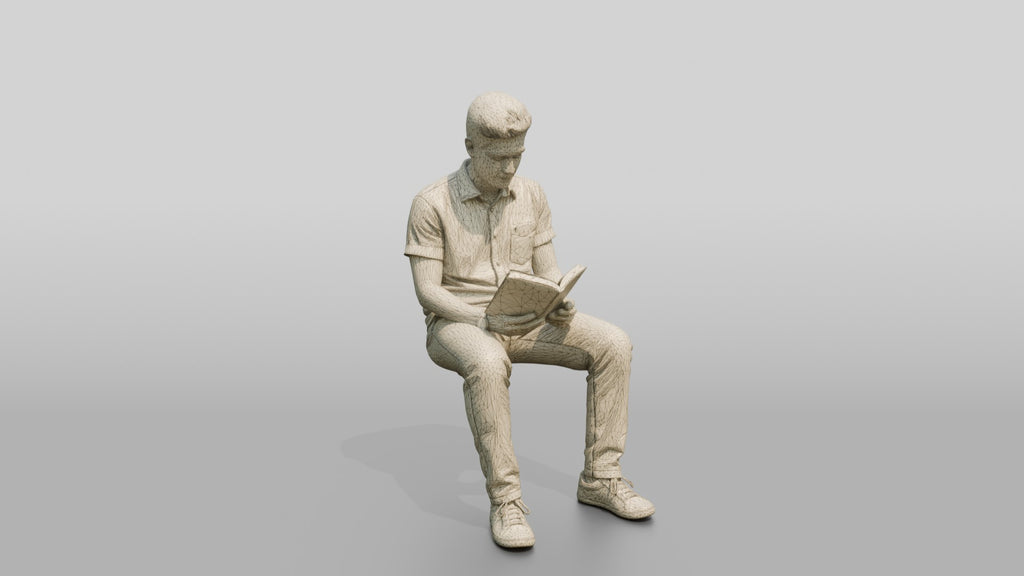 Young Syrian Man Reading on a Park Bench