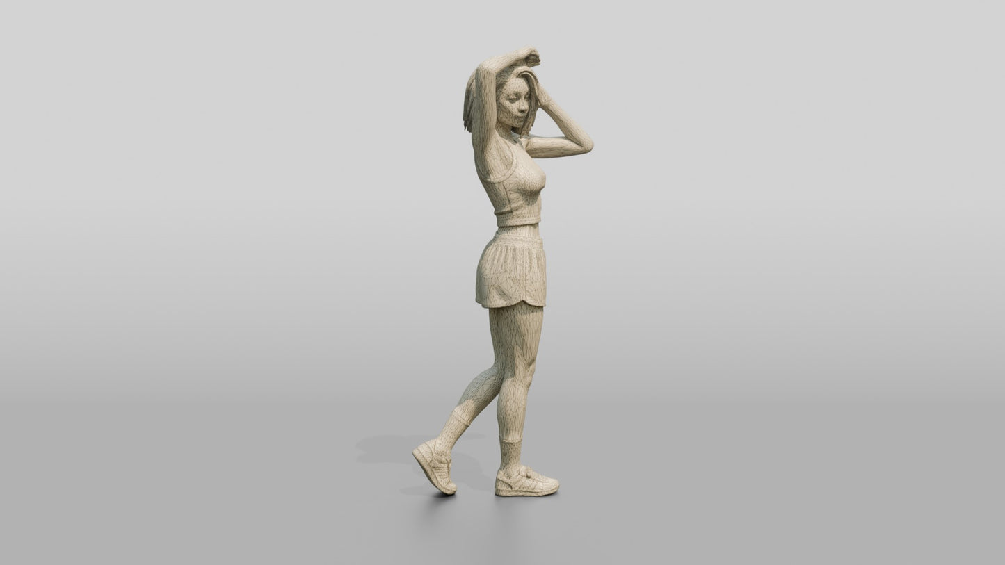 Woman Posing with Hands in Hair in Green Skort