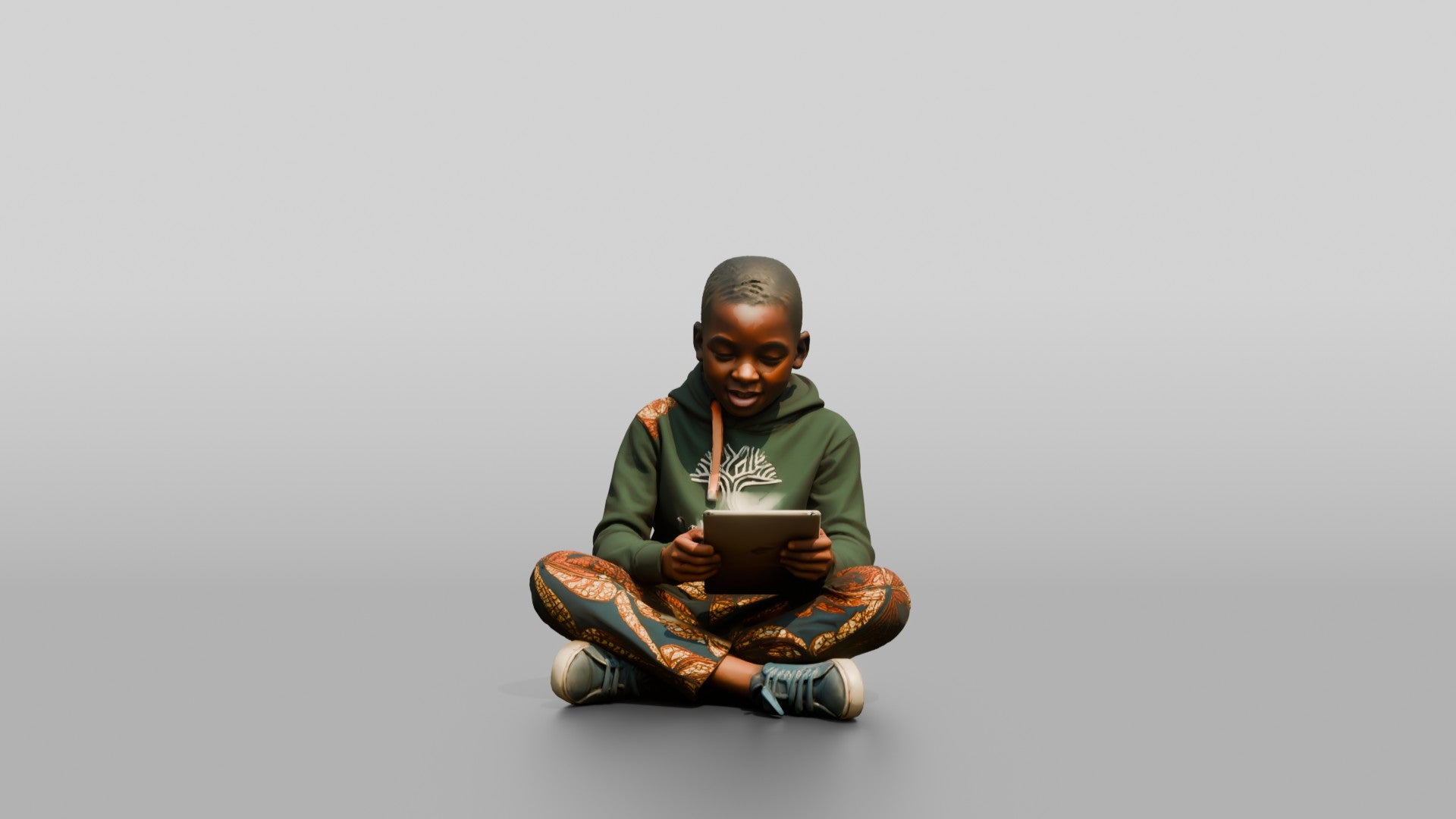 African Boy Sitting Cross-Legged with a Tablet