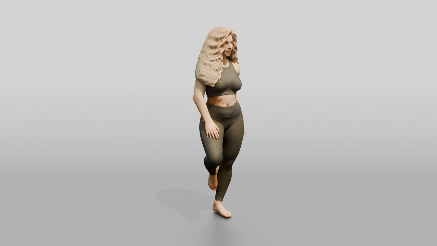 Blonde Woman in Charcoal Activewear in Tree Pose