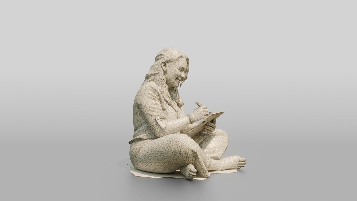 Woman Seated on the Floor with a Tablet