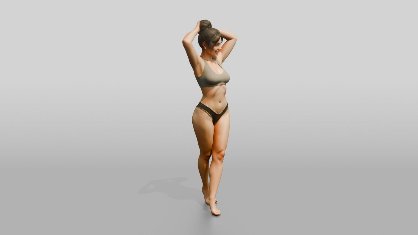 Woman in Black Two-Piece Swimsuit with Arms Raised