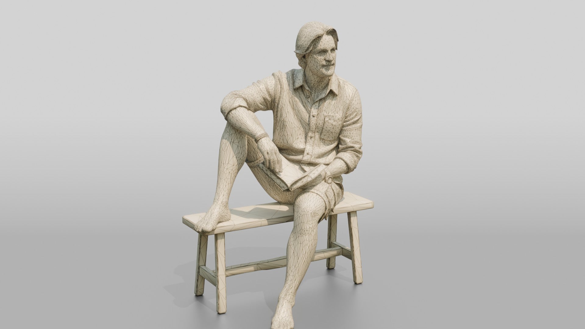 Man Reading a Book on a Bench