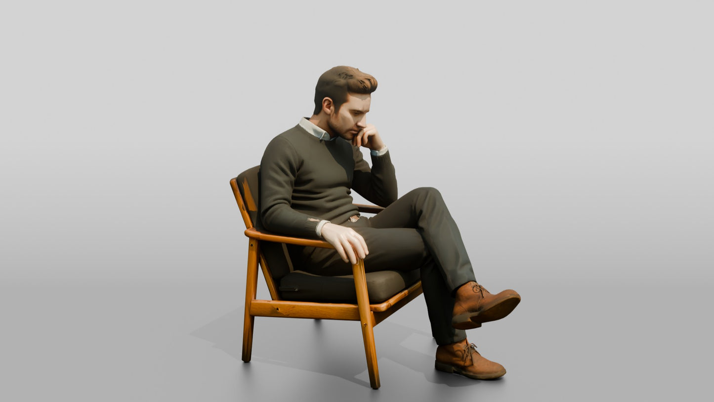 Man Sitting Thoughtfully in a Chair