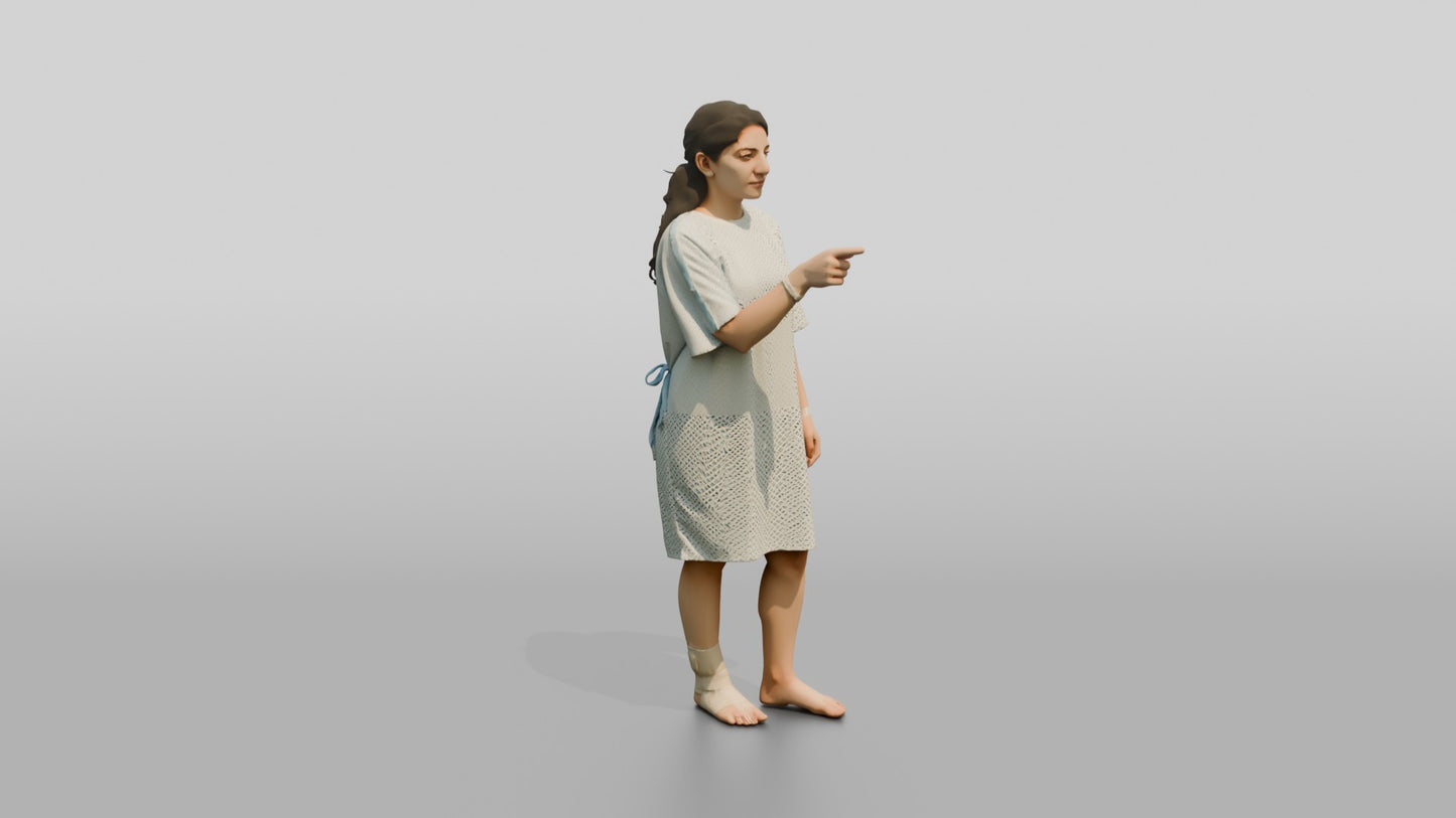 Woman Patient Pointing with an Ankle Injury