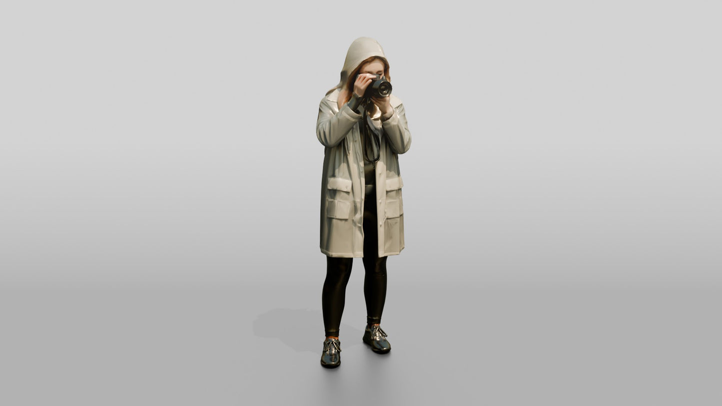 White Woman in Poncho Taking a Photo