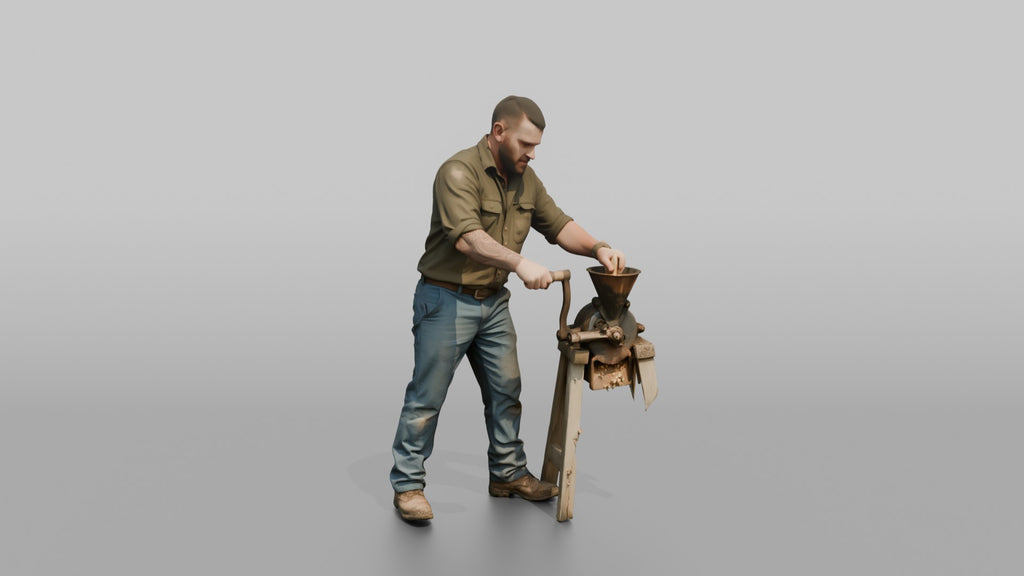 Farmer Operating Hand Cranked Corn Sheller